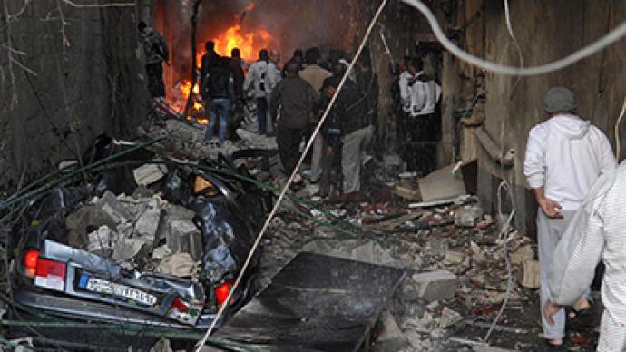 At least 34 people killed in twin blasts in Damascus