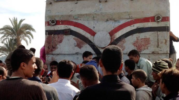 At least 50 children killed in Egypt as train hits bus