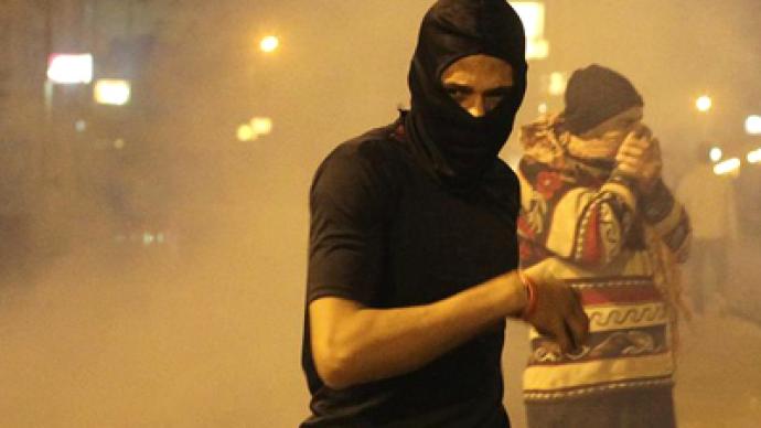 Tear gas, water cannons as Egyptians throw stones at presidential palace