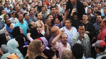 Egypt backs Islamist constitution in first round vote – unofficial results