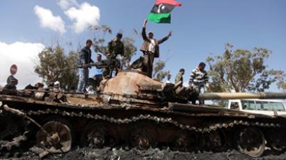 Libyan rebels cage black Africans in zoo, force feed them flags (SHOCK VIDEO)