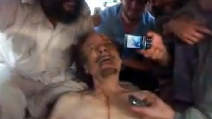 'Send this to Assad': New shock video shows rebels mocking Gaddafi body