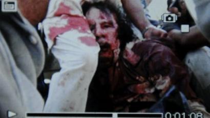 Gaddafi died from gunshot wound - autopsy