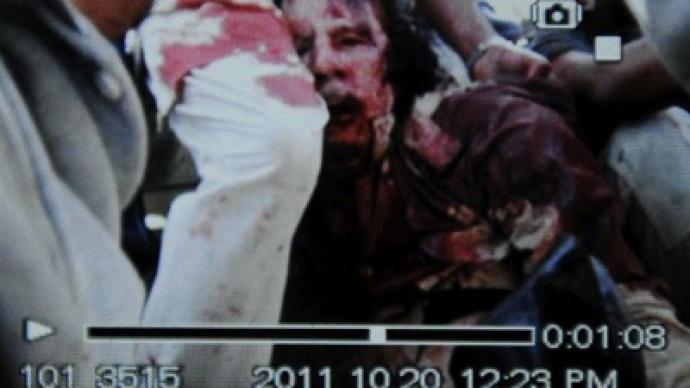 Captured Gaddafi covered in blood - FIRST PHOTO
