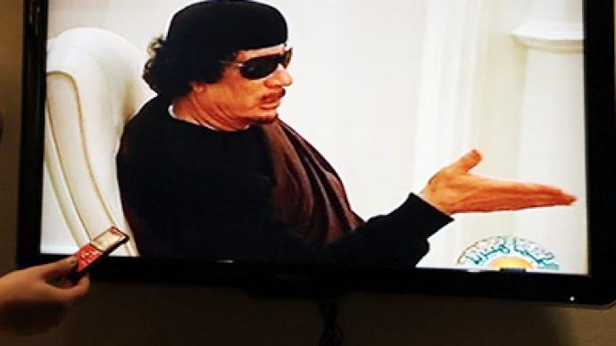Gaddafi appears on TV after two-week absence
