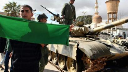 Gaddafi bites the bullet, NATO bombs rebels
