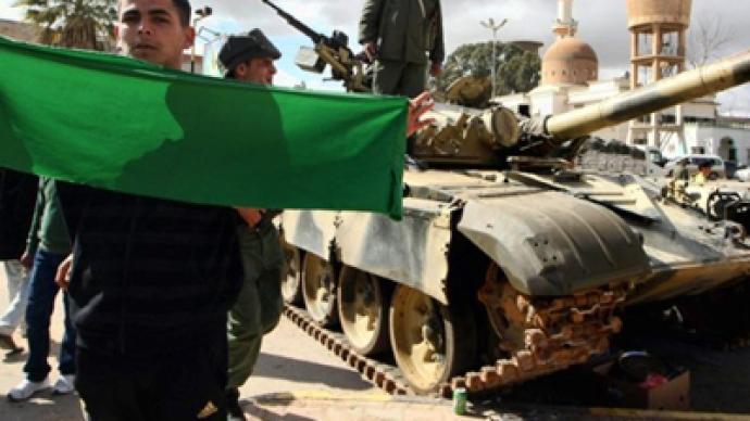 Gaddafi winning ground war, coalition battles on