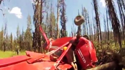 Driver survivor: Trucker cheats death with acrobatic grace (VIDEO)