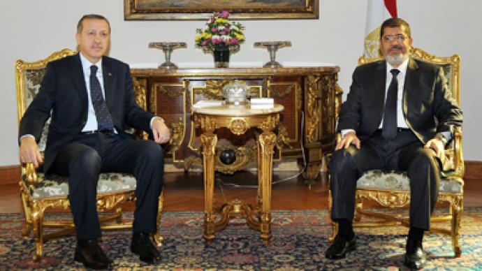 Morsi: Israel and Hamas “could soon” agree a truce — RT World News