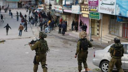 Undercover IDF raid ignites mass clashes, injuries in West Bank