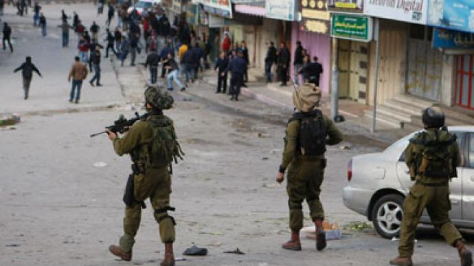 Hebron brawl: IDF soldiers clash with Palestinian police