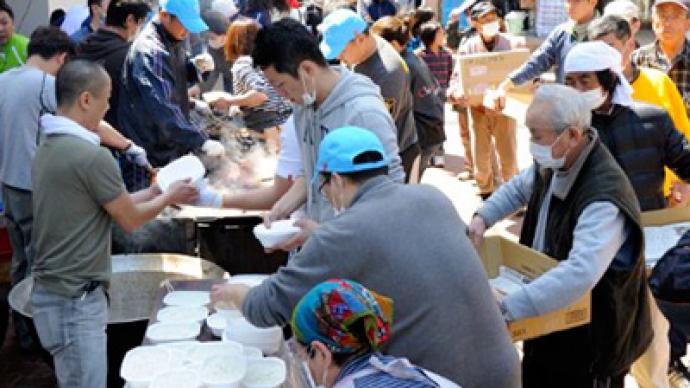 Volunteers across Japan unite to rebuild devastated towns and lives