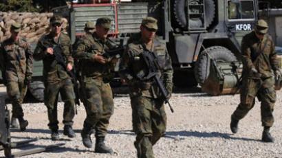 NATO gives Serbs until Monday to clear barricades