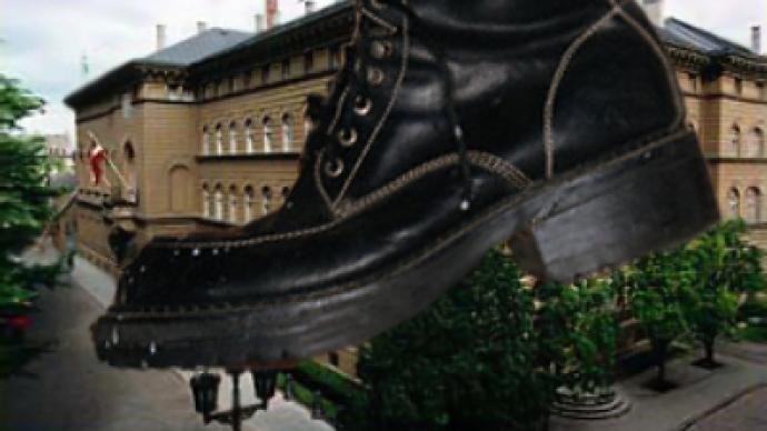 Latvians stage shoe-throwing protest