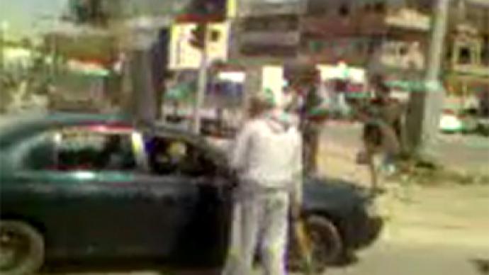 Militia and Gaddafi loyalists clash outside Tripoli
