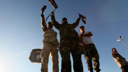 Libya to dissolve militias as Islamist strongholds fall