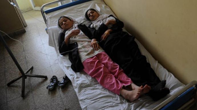 Another mass poisoning in Afghanistan, as women flee fearing Taliban