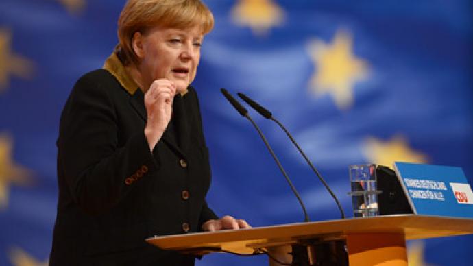 Merkel projected to win third term despite EU outrage