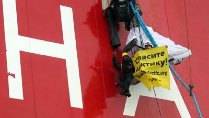 Greenpeace activists climb Russian Arctic oil rig to protest drilling
