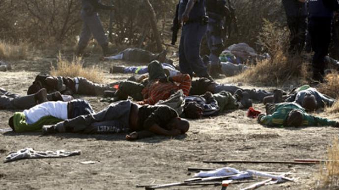 At least 30 killed as S. African police open fire on thousands of striking miners