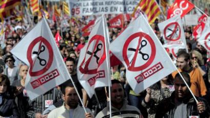 Spain tightens belt despite protests amid growing concern over its fiscal health