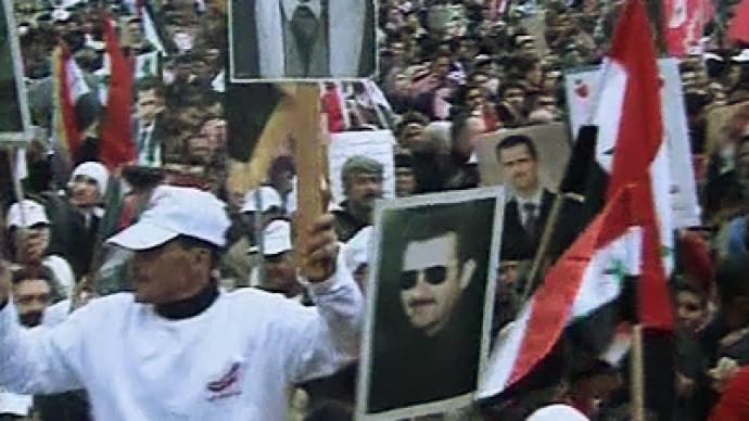 Pro-Assad rally in Damascus decries ‘one-year conspiracy’ (VIDEO) — RT ...