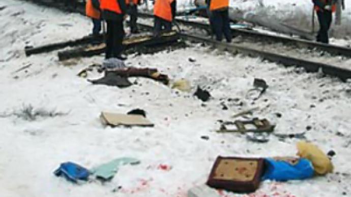 Train slams into bus in Russia killing six