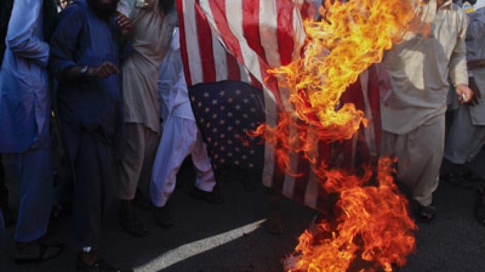 All fired up! Pakistani flag makers cash in on anti-US rage