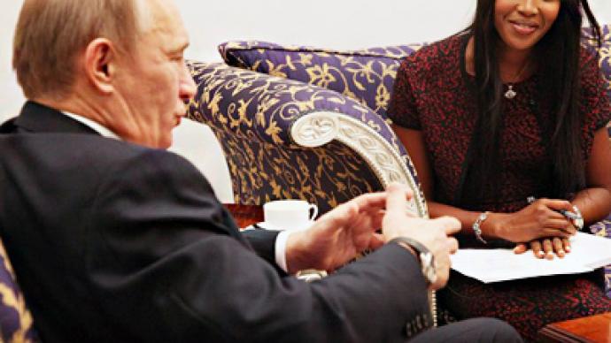 Putin talks tigers with Naomi Campbell