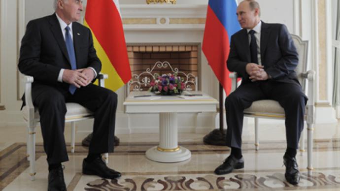 Putin pledges constant help to South Ossetia president