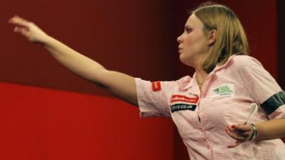 Russian defends darts world crown