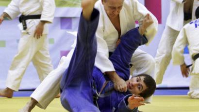 Putin promoted in judo hierarchy