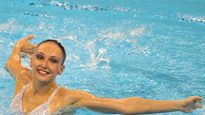 Ischenko claims perfect record at swimming worlds
