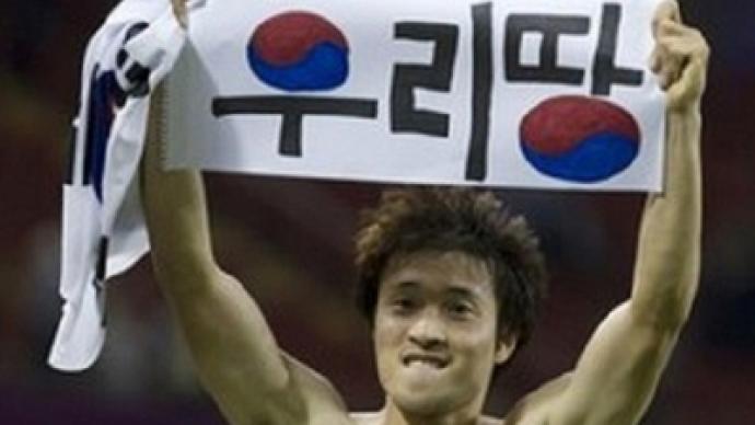 Political banner may cost South Korean footballer his Olympic medal 
