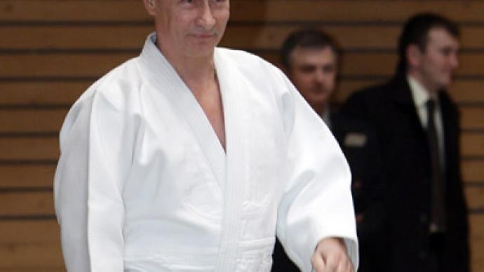 Putin promoted in judo hierarchy