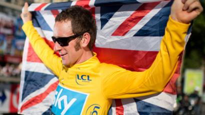 Tour de France winner Wiggins run over by car  