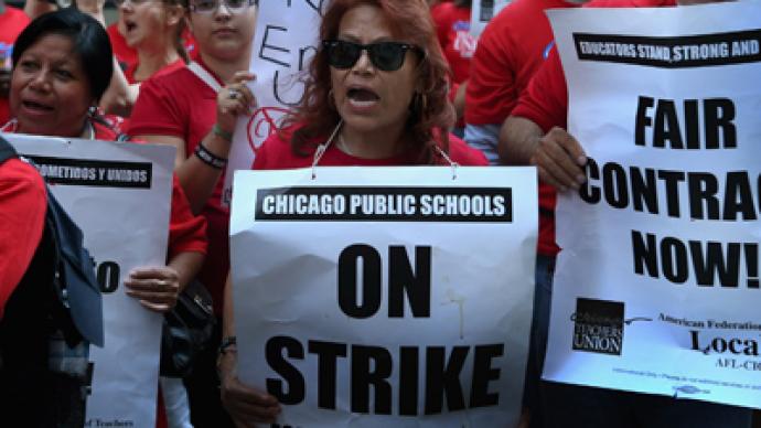 Angry Chicago teachers take on Obama