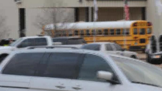 Alabama gunman shoots school bus driver, takes child hostage