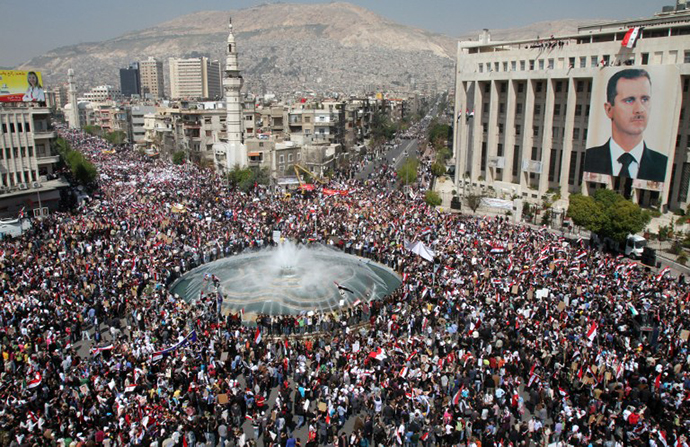 Thousands of Syrians rally to show their support for President Bashar al-Assad in Damascus on March 29, 2011. (AFP Photo / Anwar Amro)