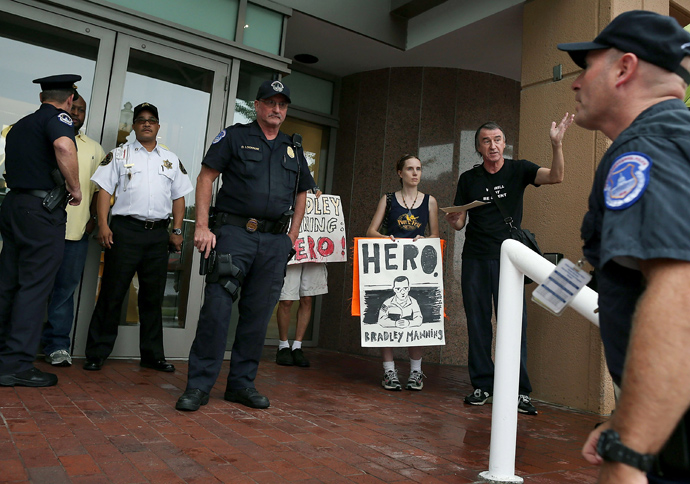 Police confront supporters of accused WikiLeaks whistleblower Bradley Manning during a protest in front of the Democratic National Committee headquarters, on September 6, 2012 in Washington, DC (Mark Wilson / Getty Images / AFP)