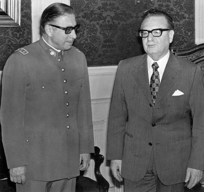 General Augusto Pinochet (left) poses with Chilean president and Marxist leader Salvador Allende 23 August 1973 in Santiago. (AFP Photo)
