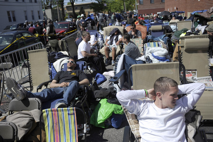 Job seekers wait in front of the training offices of Local Union 46, the union representing metallic lathers and reinforcing ironworkers, in the Queens borough of New York (Reuters/Keith Bedford)