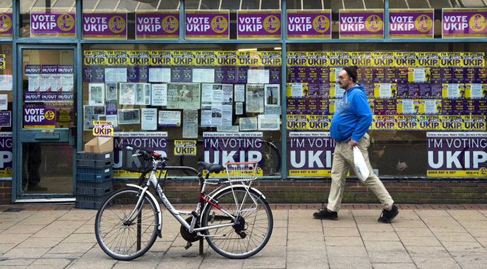 A man walks past the British UK Independence Party (UKIP) office in Eastleigh, southern England, on February 25, 2013. (AFP Photo / Adrian Dennis)