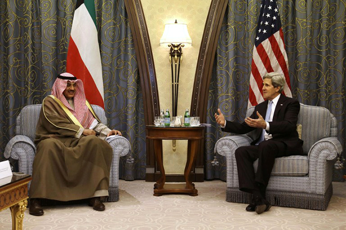 U.S. Secretary of State John Kerry (R) meets with Kuwaiti Foreign Minister Sheikh Sabah al-Sabah at a hotel in the Saudi capital Riyadh on March 4, 2013. (AFP Photo / Jacquelyn Martin)