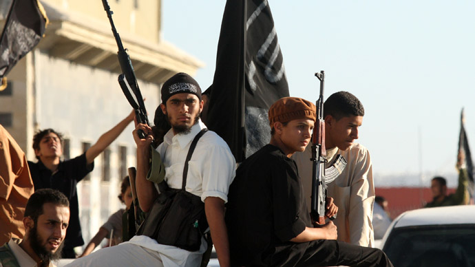 Anti-Gaddafi fighters take part in a demonstration in Benghazi June 7, 2012 to demand the application of Islamic law, or Sharia law, in Libya. (Reuters/Esam Al-Fetori)