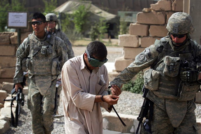 An Iraqi man detained by US forces for alleged links to al-Qaeda. (AFP Photo / David Furst)