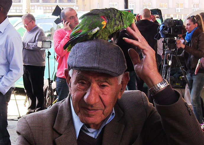 Not quite Damocles, but local Nicosian demonstrates the concept to us in front of Bank of Cyprus (Photo by Patrick Henningsen)