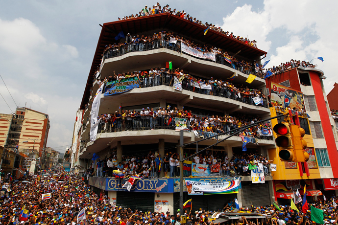 Supporters of Venezuela's opposition leader and presidential candidate Henrique Capriles attend a campaign rally in the state of Merida April 10, 2013 (Reuters / Carlos Garcia Rawlins)