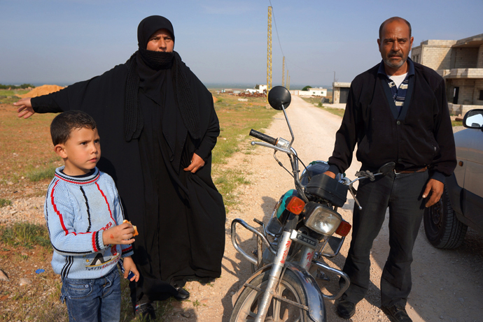 Heâs a Sunni, sheâs a Shiite, they have 5 children. They were driven out of Syria for their faith, in addition to that they were shot at in the morning. (Photo by Nadezhda Kevorkova)