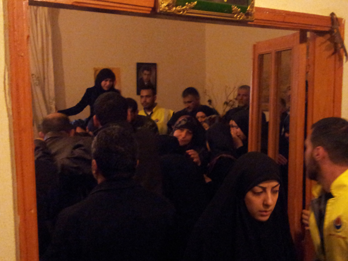 The martyrâs body is being carried into his motherâs room and then into the room of his family (Photo by Nadezhda Kevorkova)